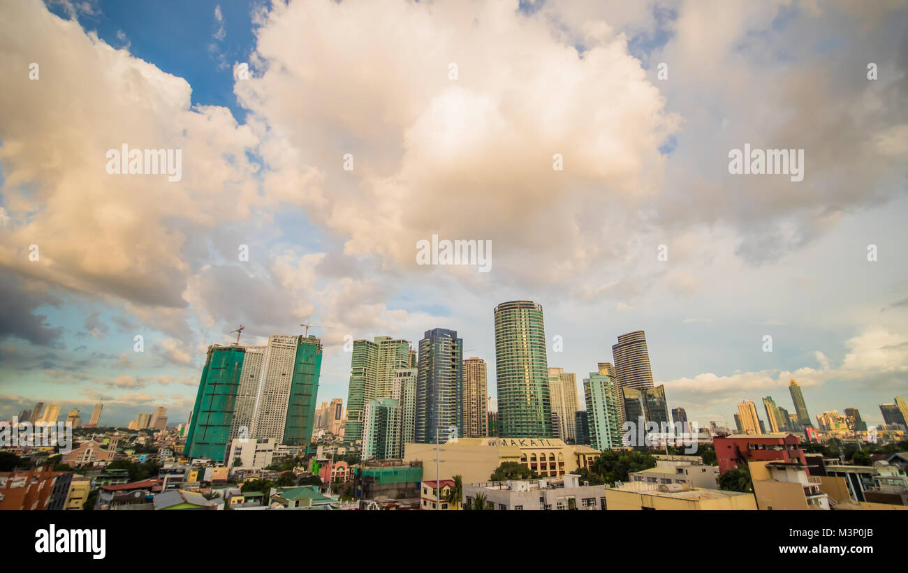 Makati is a city in the Philippines Metro Manila region and the country s financial hub. It s known for the skyscrapers. Evening time. Stock Photo