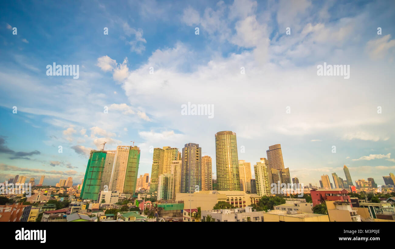 Makati is a city in the Philippines Metro Manila region and the country s financial hub. It s known for the skyscrapers. Evening time. Stock Photo