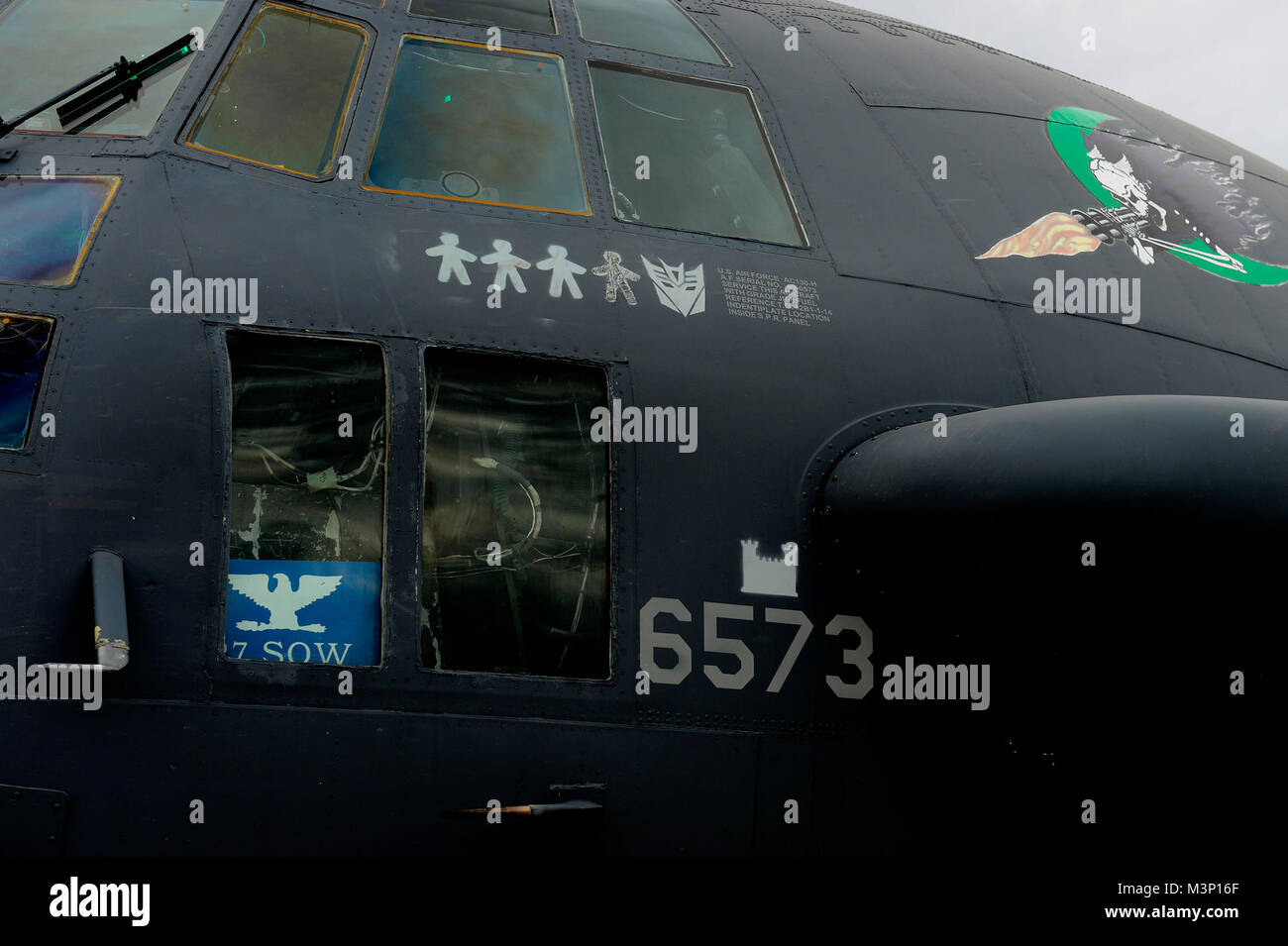 An AC-130H from the 16th Special Operations Squadron 'Heavy Metal', proudly displays its 'Decepticon' kill marking under the pilot's window April 8, 2015 at Cannon Air Force Base, N.M.  (U.S. Air Force photo by Staff Sgt. Matthew Plew) 110127-F-1644L-281 by AirmanMagazine Stock Photo