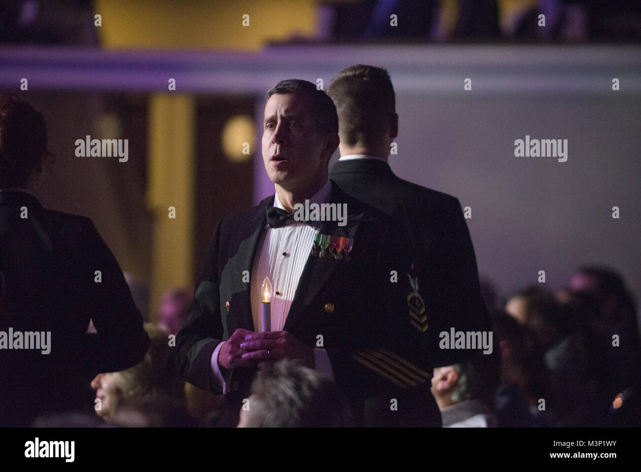 171216-N-VV903-1196 WASHINGTON (Dec. 16, 2017) Senior Chief Musician Adam Tyler performs with the U.S. Navy Band during a holiday concert at DAR Constitution Hall in Washington. The Navy Band hosted thousands of people from the Washington area as well as hundreds of senior Navy and government officials during its three annual holiday concerts. (U.S. Navy photo by Musician 1st Class David Aspinwall/Released) 171216-N-VV903-1196 by United States Navy Band Stock Photo