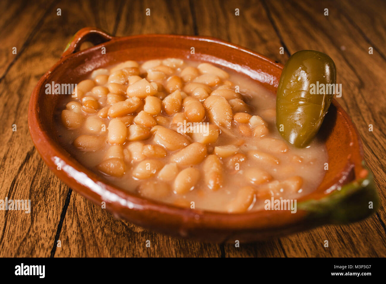 Mexican beans whit green and red spicy sauce in mexico city mexican
