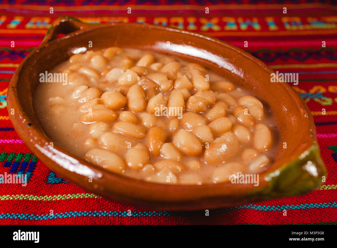 Mexican beans whit green and red spicy sauce in mexico city mexican