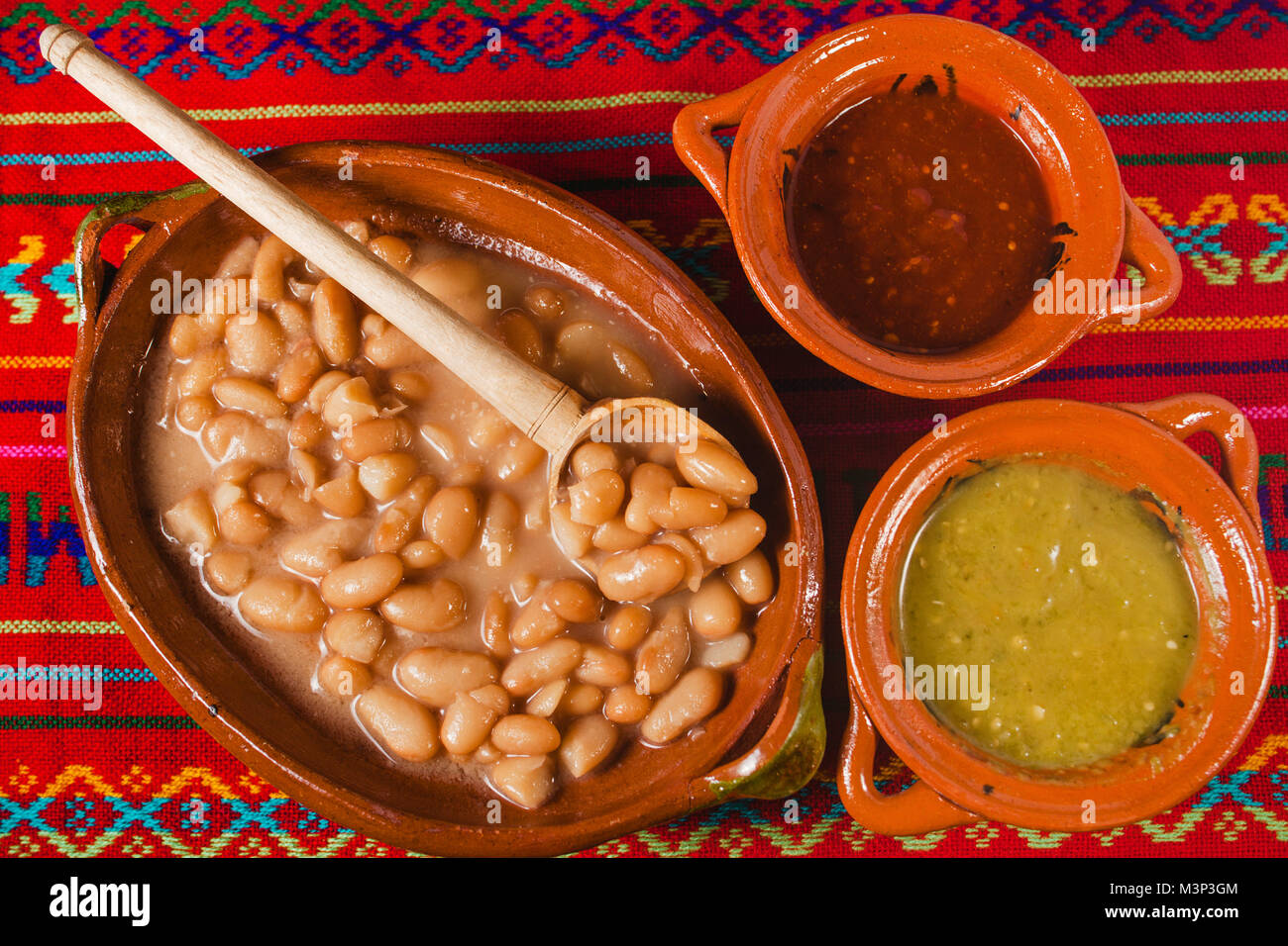 Mexican beans whit green and red spicy sauce in mexico city mexican