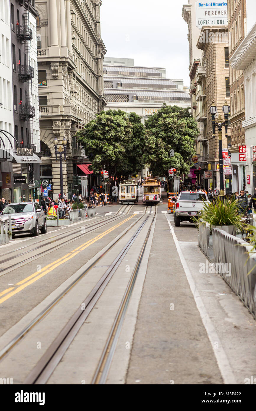 SAN FRANCISCO Ca. - JUNE 16: Passengers ride in a cable car JUNE 16, 2015 in San Francisco. It is the most popular way to get around the City of San Stock Photo