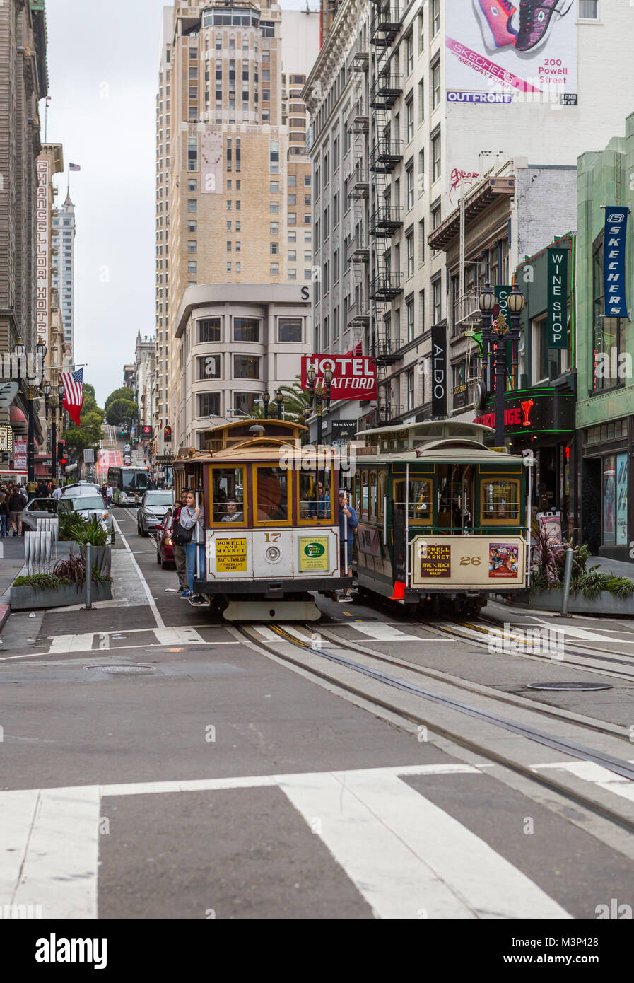 SAN FRANCISCO Ca. - JUNE 16: Passengers ride in a cable car JUNE 16, 2015 in San Francisco. It is the most popular way to get around the City of San Stock Photo