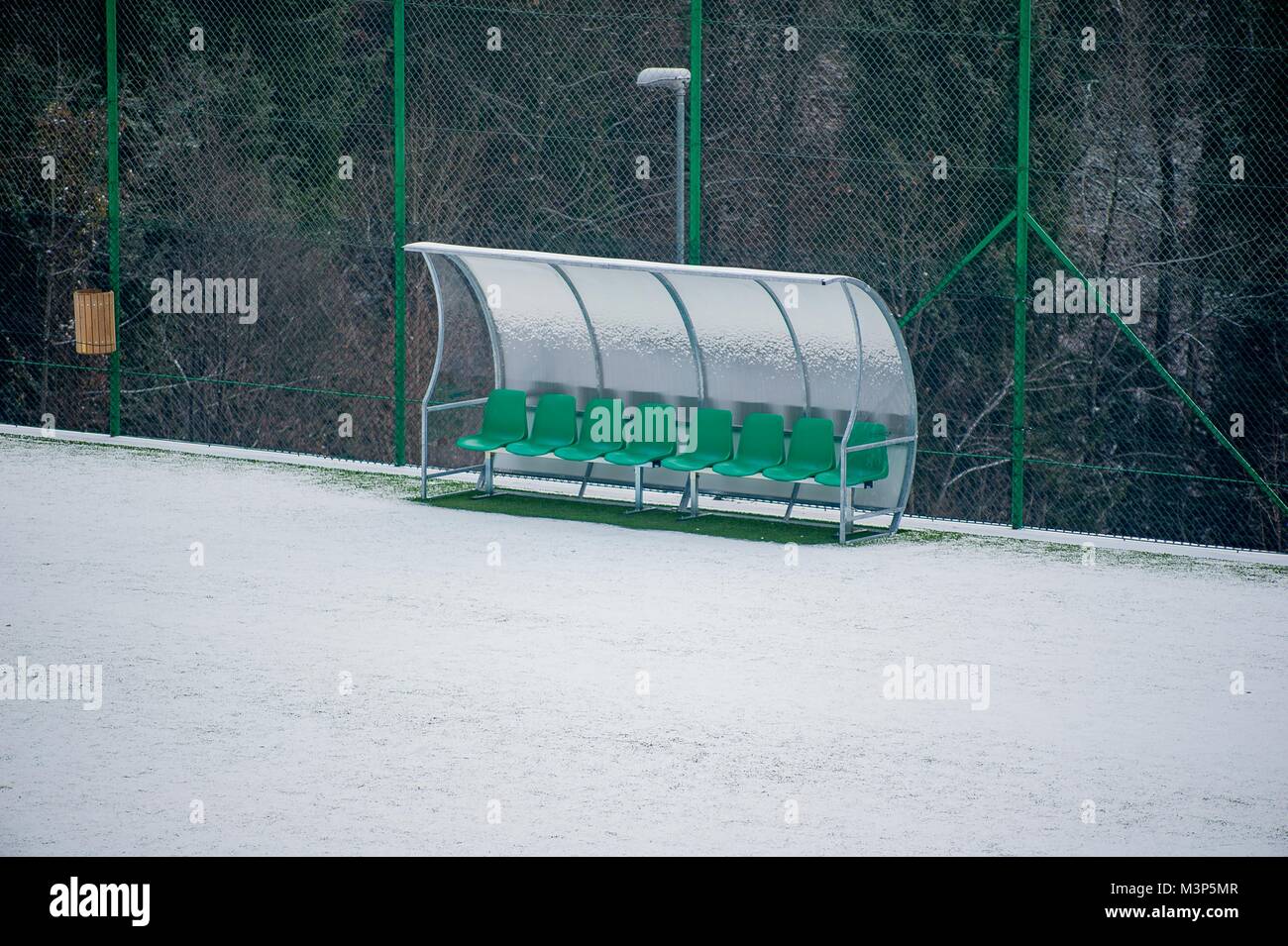 soccer field covered with snow Stock Photo