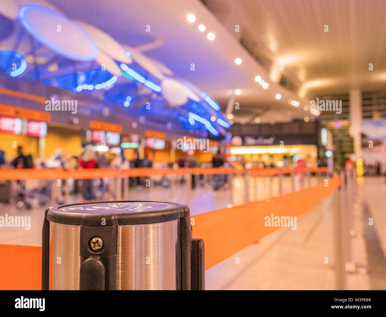 Queue Line in Airport with Blur Background, Crowd Control Retractable Belt Stock Photo