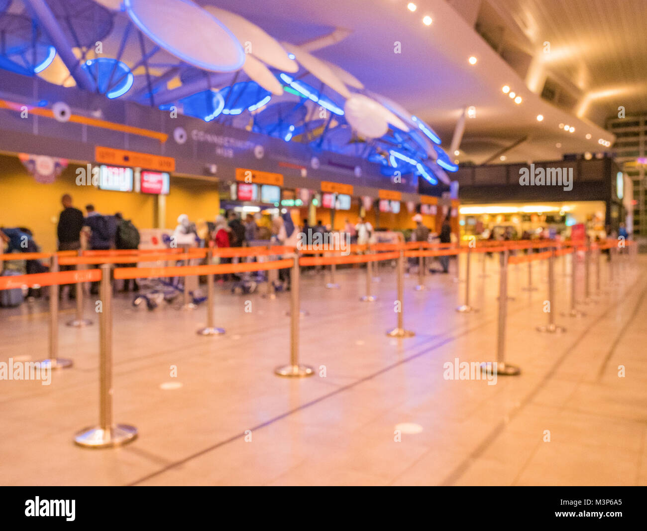 Queue Line in Airport with Blur Background, Crowd Control Retractable Belt Stock Photo