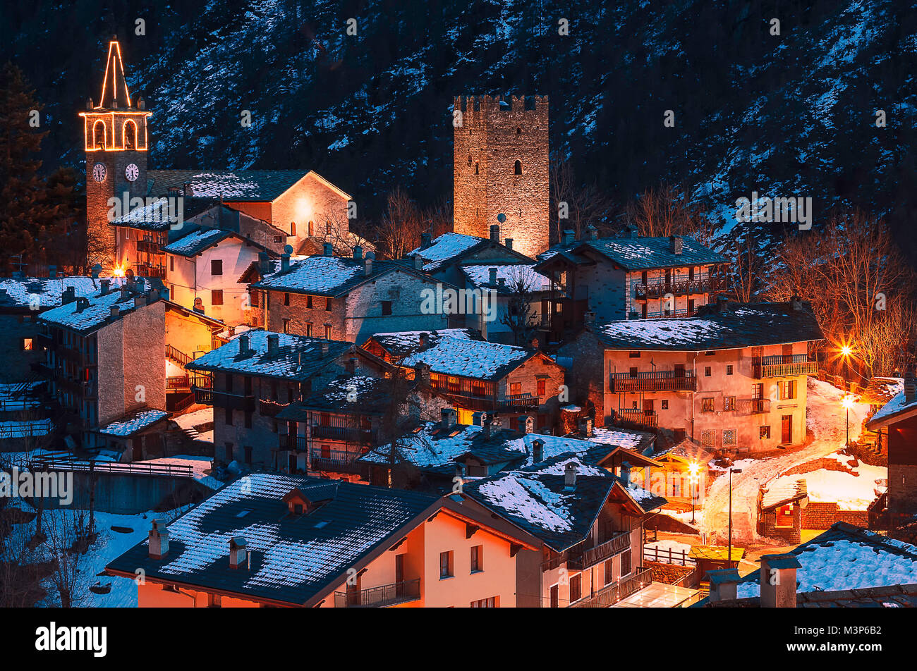 a nice old village in mountain during the winter season close to the xmas in Italy Stock Photo