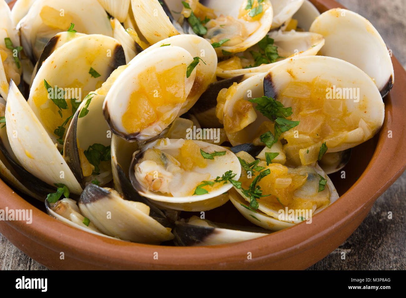 Clams with marinera sauce.Almejas a la marinera. Spanish recipe on