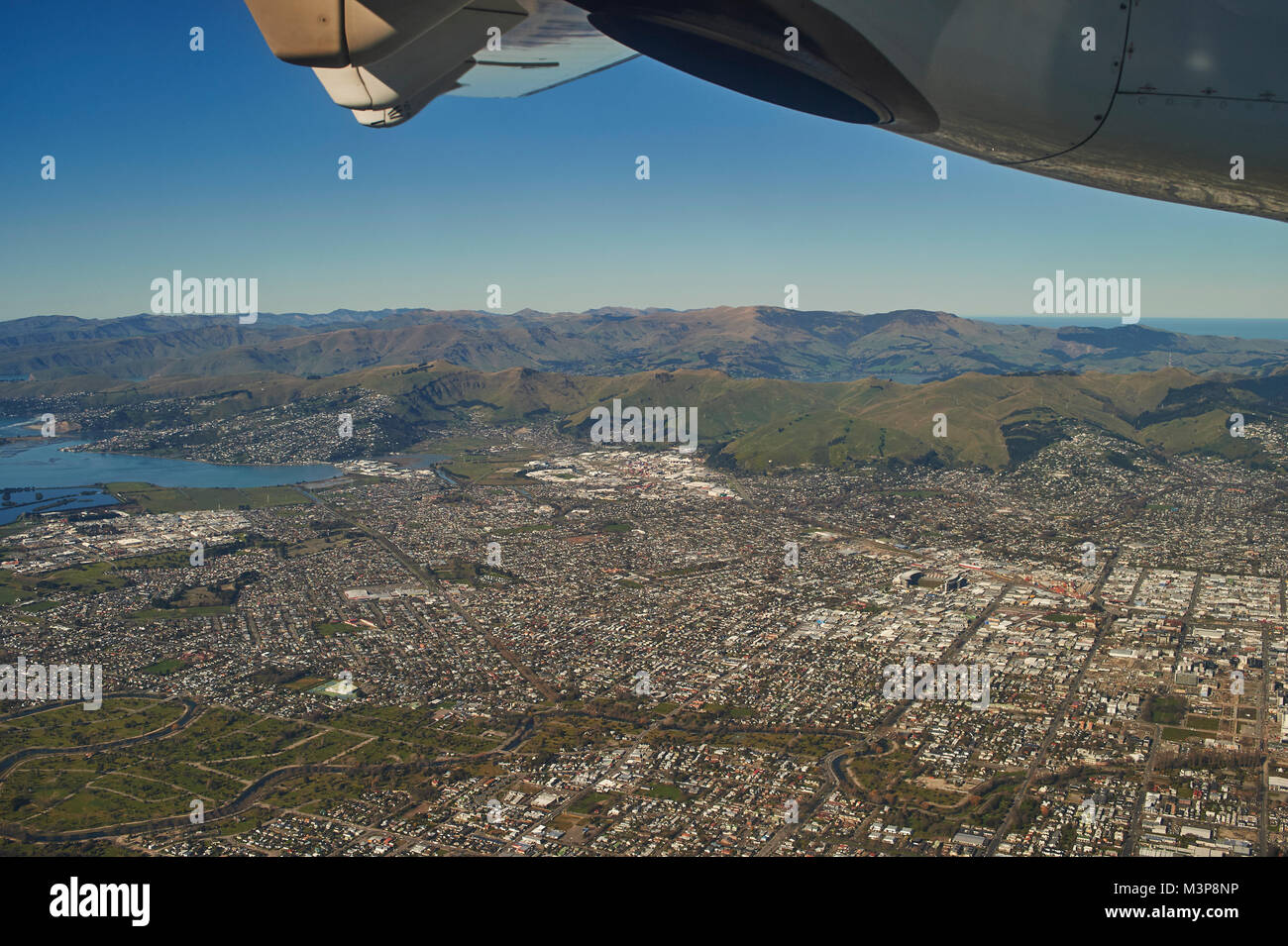 Aerial view of Christchurch showing Akaroa Peninsula to left Stock Photo