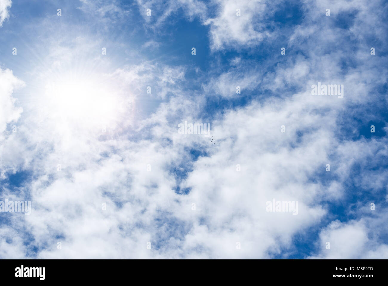 Sunlight on blue sky with cloudscape background Stock Photo - Alamy