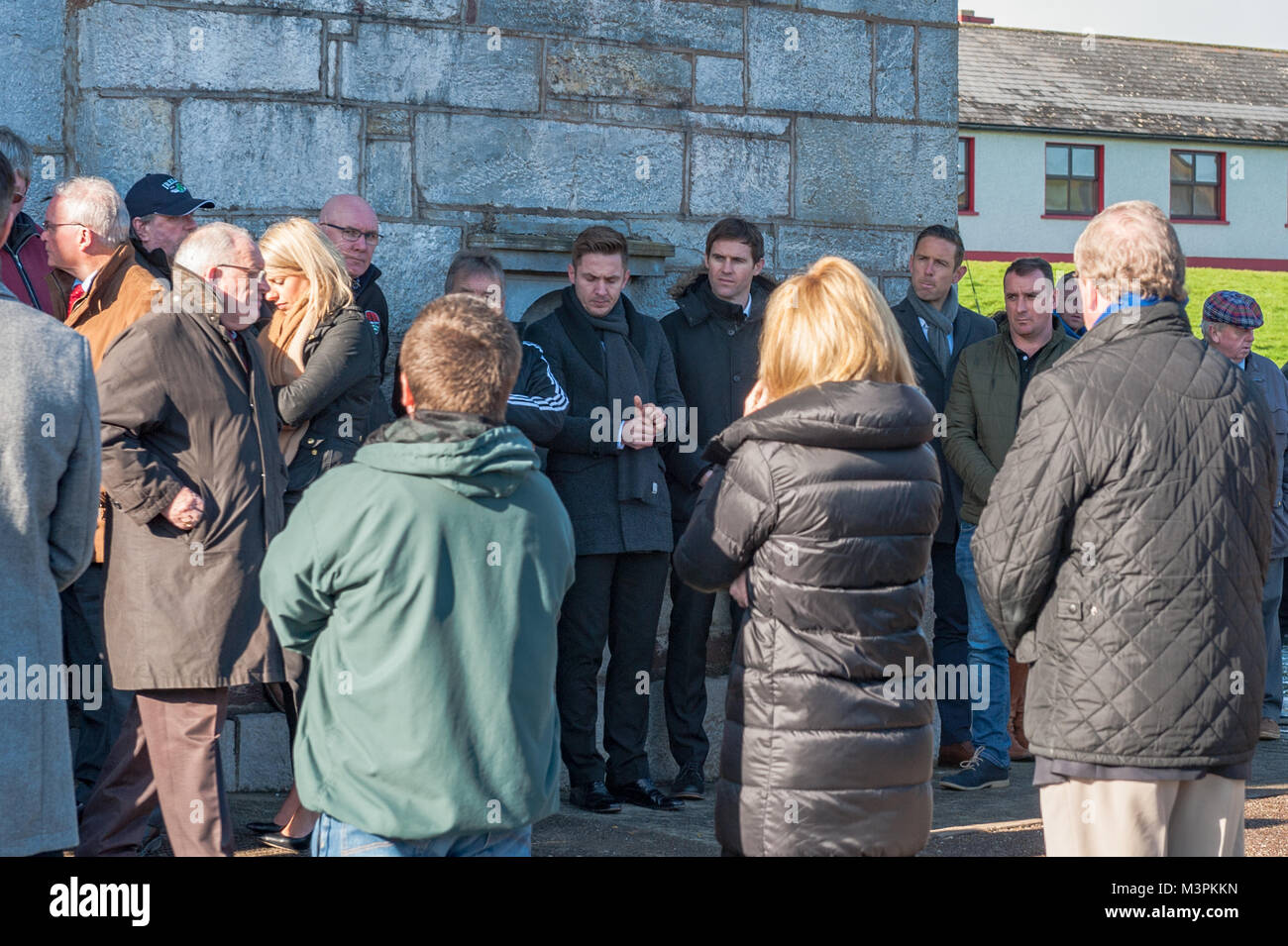 Ovens, Ireland. 12th Feb, 2018. The funeral of footballer Liam Miller took place today at St. John the Baptist Church, Ovens, County Cork, Ireland. A huge number of mourners attended the funeral, including many footballers from Miller's old clubs, including Cork City, Celtic and Manchester United. Pictured are former team mates Kevin Doyle, Kevin Kilbane and Alan Bennett. Credit: Andy Gibson/Alamy Live News. Stock Photo