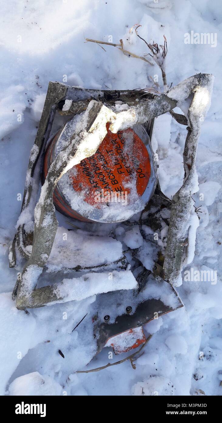 Moscow Region, Russia. February 12, 2018. Rescue workers have presumably found the flight data recorder at the crash site of the An-148 passenger plane in the Moscow Region during the search operation. The Interstate Aviation Committee (IAC) is working to confirm and identify the device. Photo: The Interstate Aviation Committee (IAC) Stock Photo