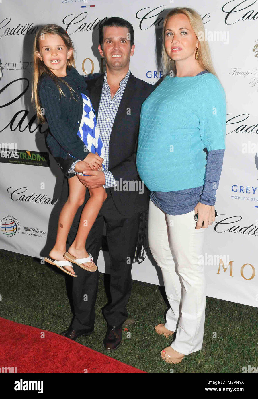 Doral, Florida- March 7: Kai, Donald Jr. and Vanessa Trump walk the red