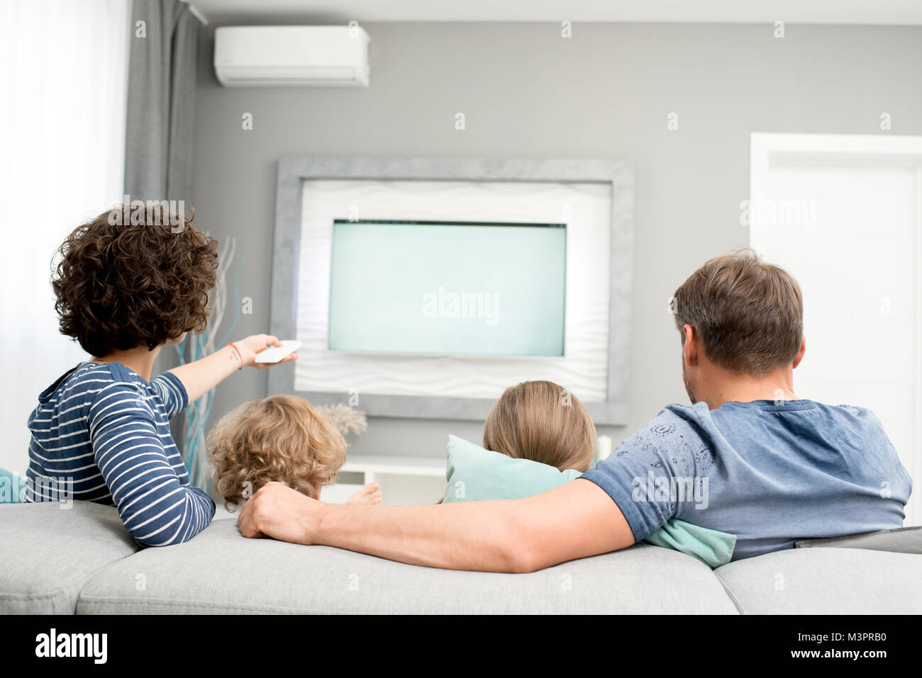 Family Watching Tv Back View Stock Photo Alamy