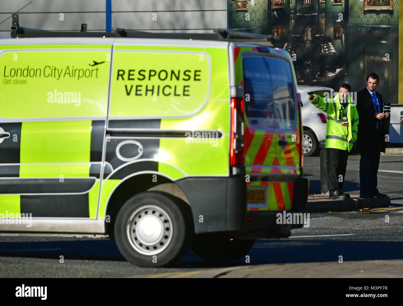 A response vehicle is parked close to London City Airport which has been closed after the discovery of an unexploded Second World War bomb. Stock Photo