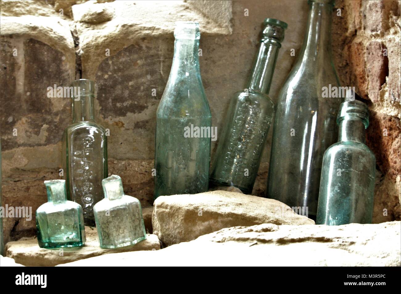 Pre 1900 Glassware & codd bottles on a windowsill in Warwickshire Stock Photo