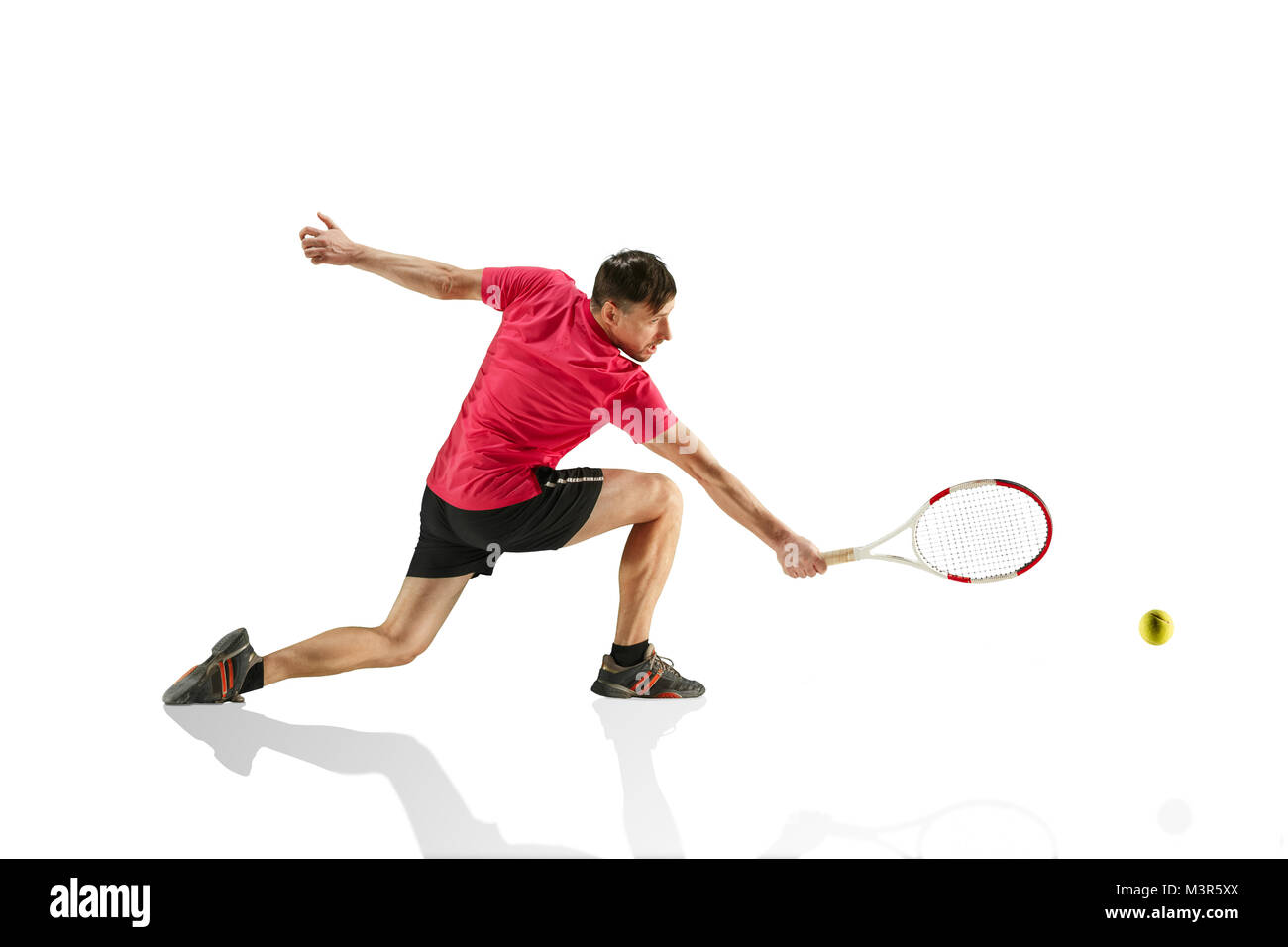one caucasian man playing tennis player isolated on white background Stock Photo