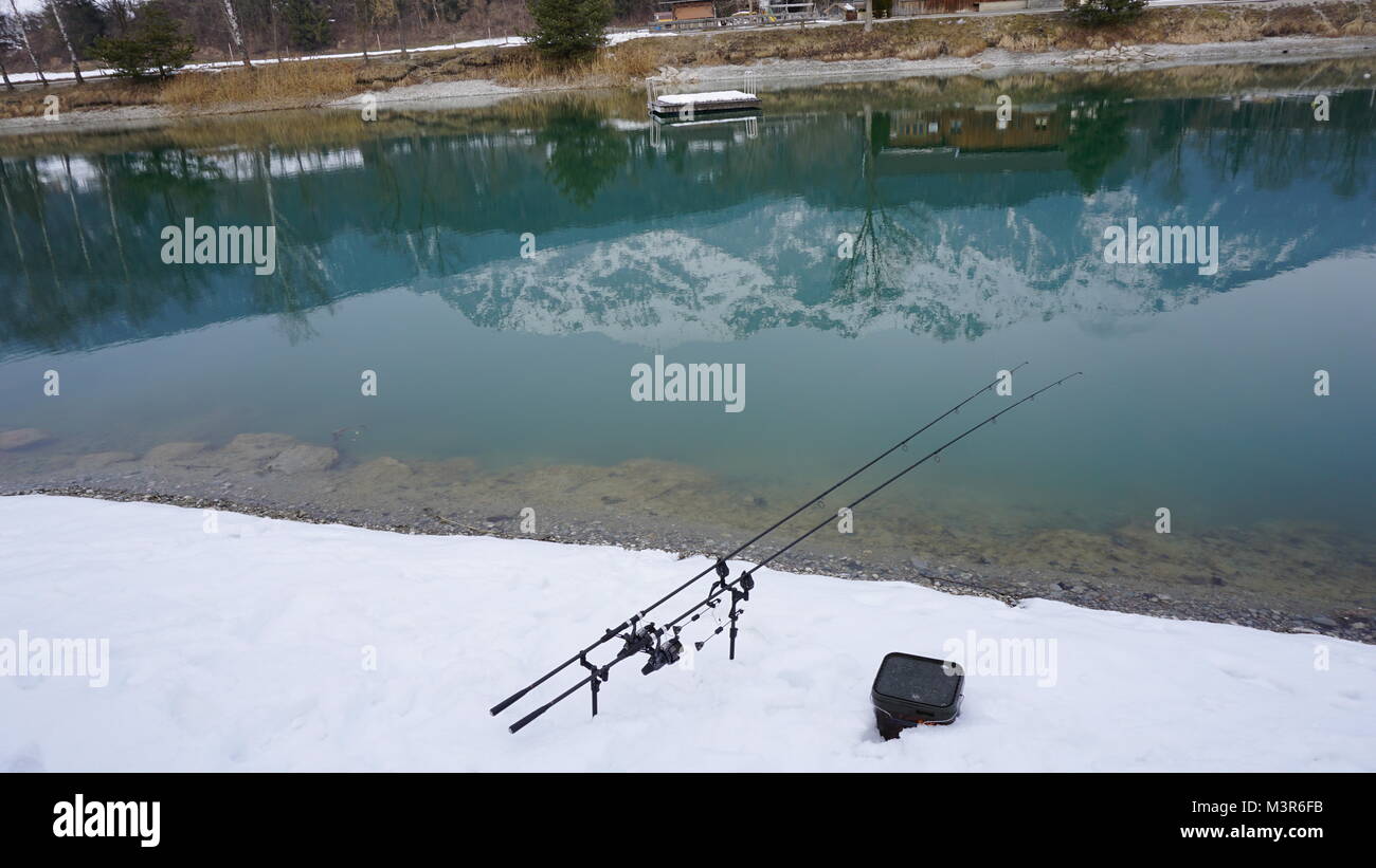 Terfens Tyrol Austria near Schwaz and Innsbruck - swimming and fishing lake Weisslahn in Winter Stock Photo