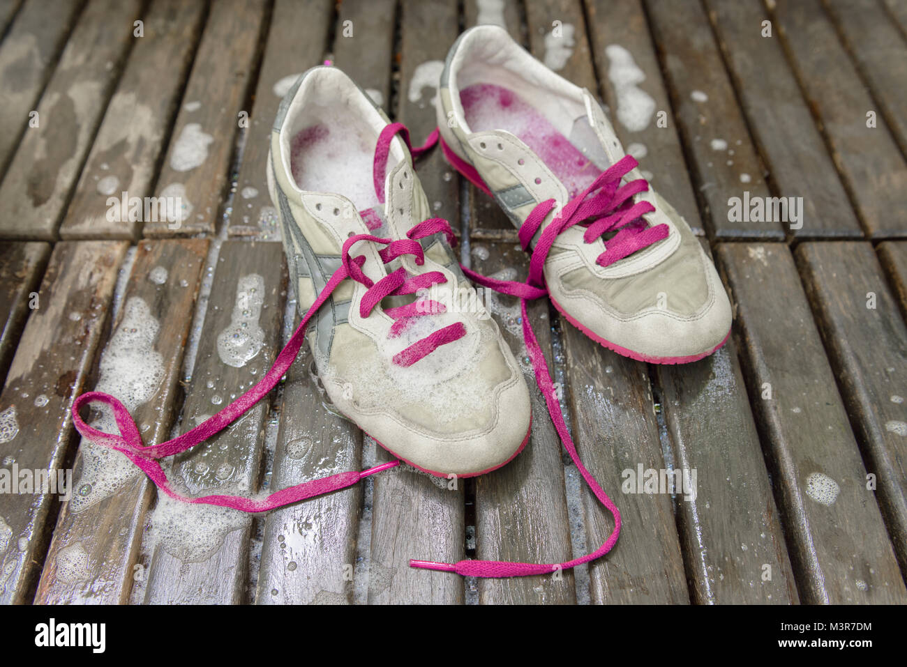 washing the dirty sneakers at home, cleaning the shoes Stock Photo - Alamy