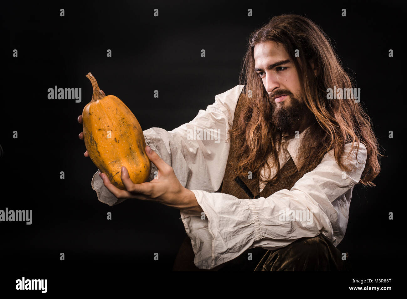Portrait Of A Man With A Beard And Long Hair Wearing A Medieval
