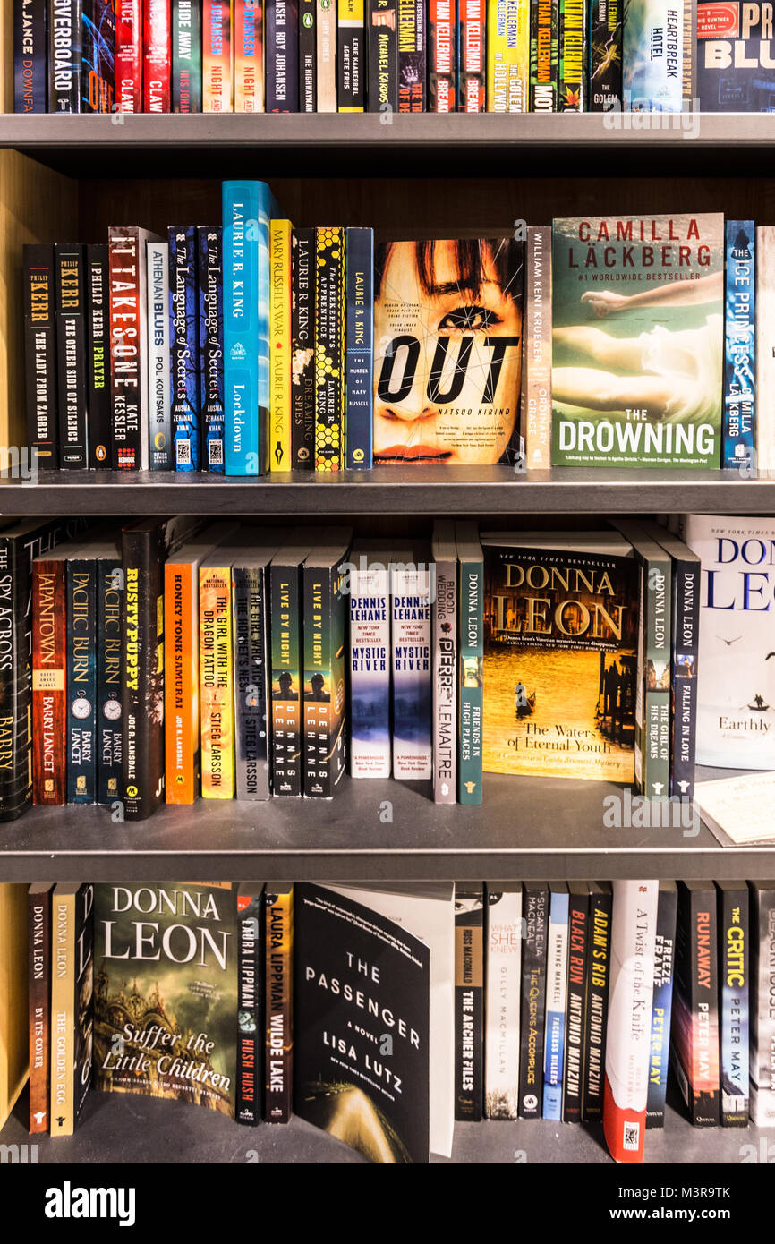 San Francisco, USA - July 2 2017: Various ficton novels are diplayed in the shelf of a bookstore in San Francisco. Stock Photo