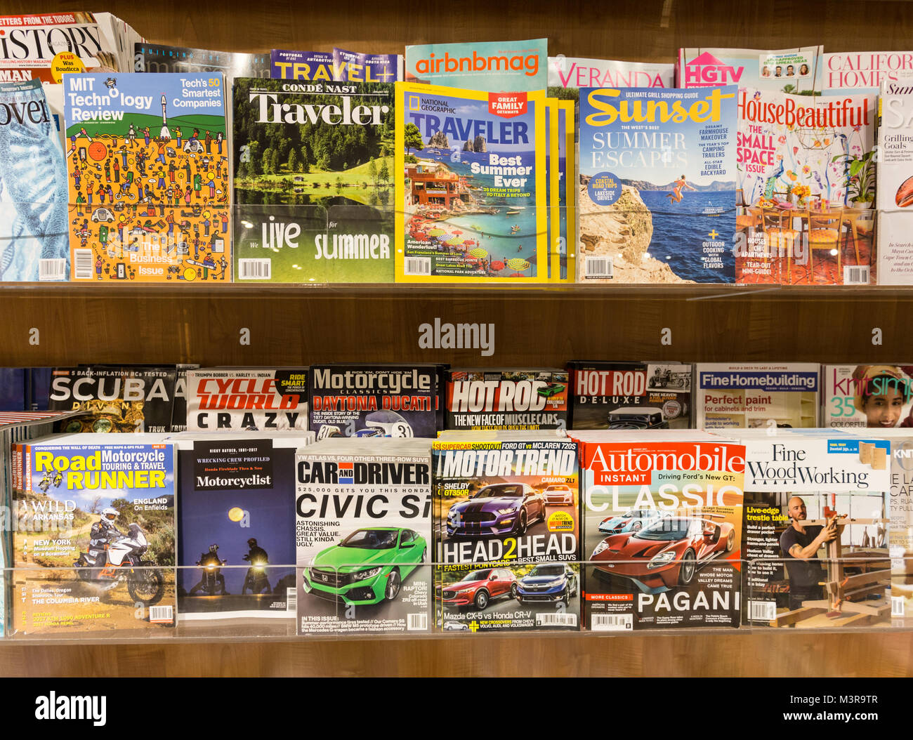 San Francisco, USA - July 2 2017: Magazines of mosty men interest subjects surch as cars, motorcycle and travel are diplayed in the shelf of a booksto Stock Photo