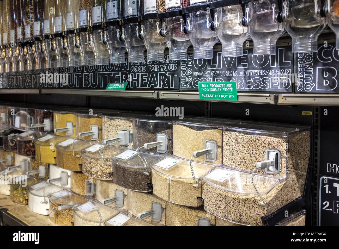Bulk grains and legumes on sale in upmarket food store Stock Photo Alamy