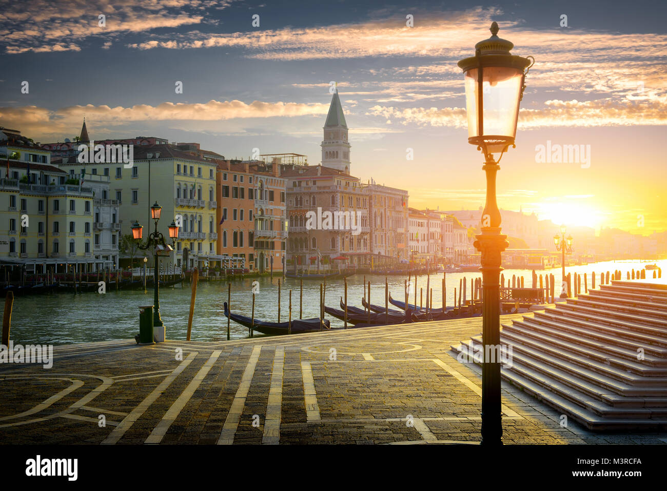 Gondolas and architecture in Venice at sunset, Italy Stock Photo - Alamy