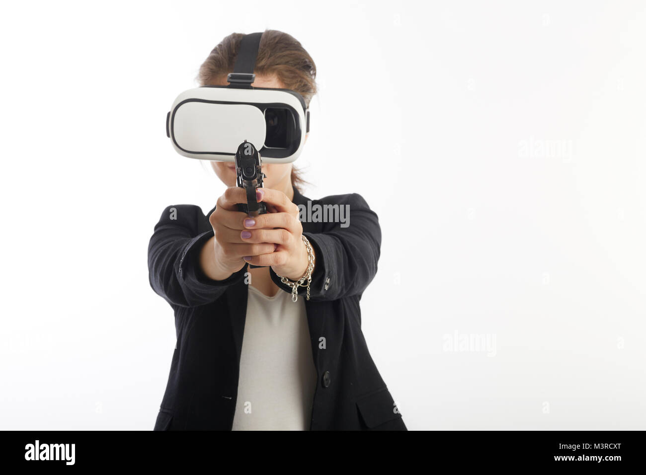 woman agent using virtual reality interface with gun Stock Photo