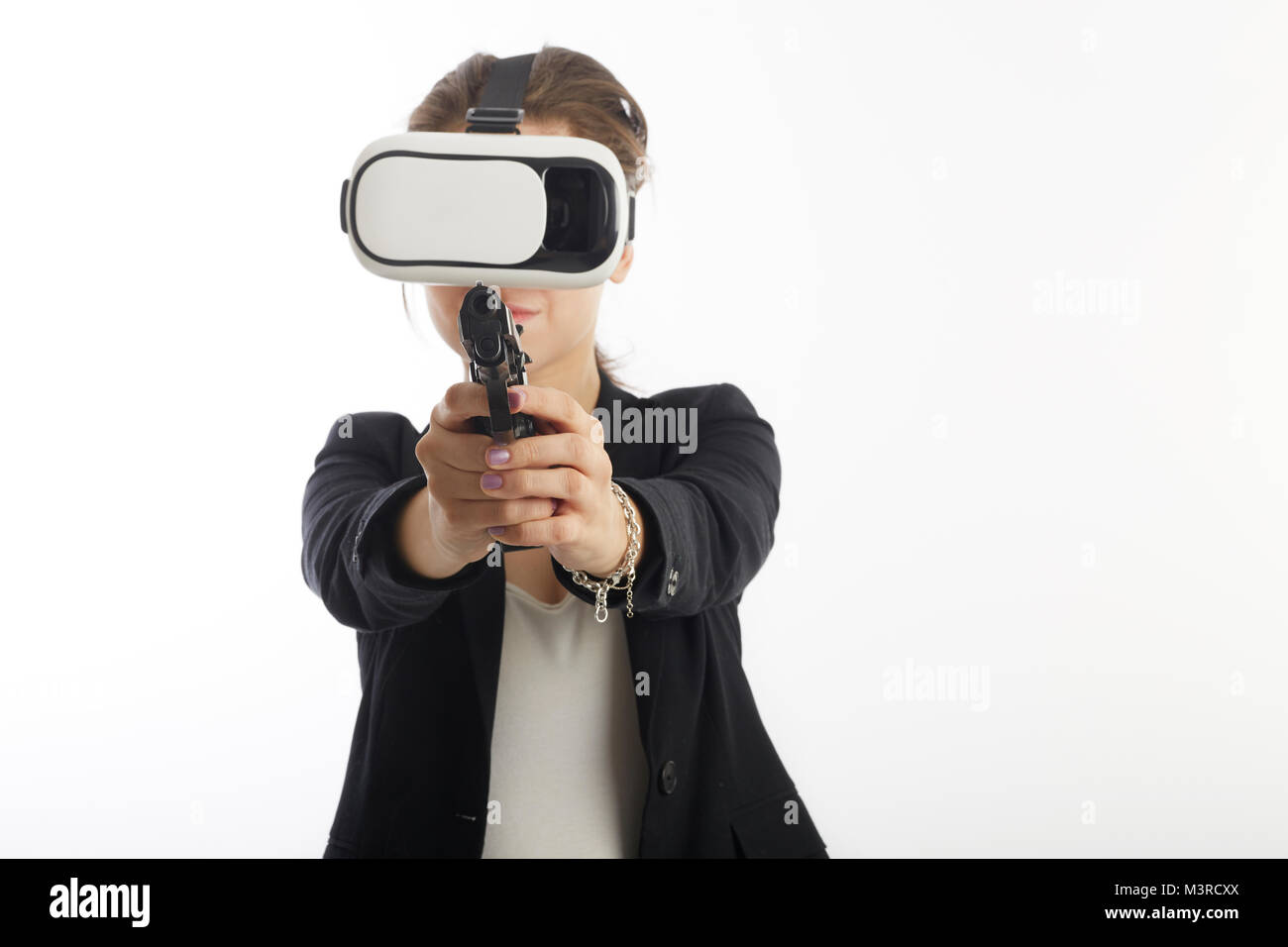 woman agent using virtual reality interface with gun Stock Photo