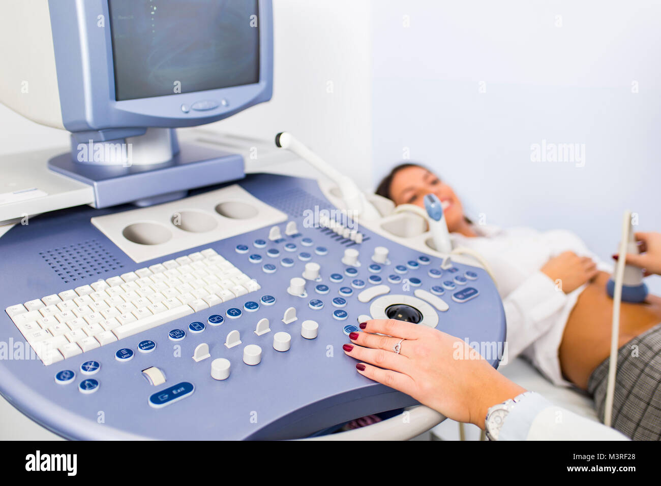Young woman with ultrasound hi-res stock photography and images - Alamy