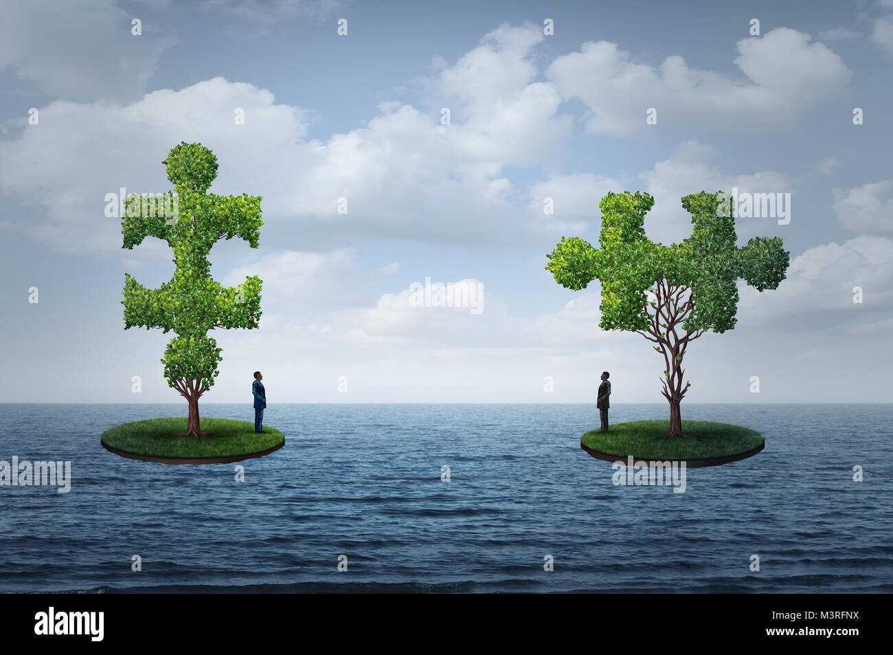 International trade challenge and global commerce puzzle as two people on seperate islands  with trees shaped as a jigsaw piesces. Stock Photo