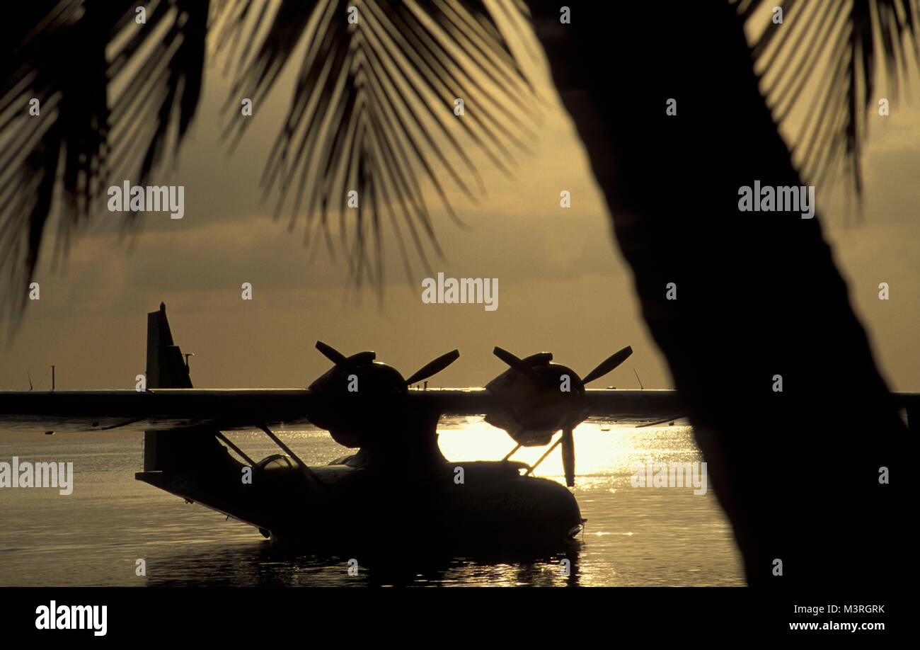 Brazil. Salvador de Bahia. Catalina PBY-5a  flying boat, hydroplane, from WOII at sunset. Stock Photo