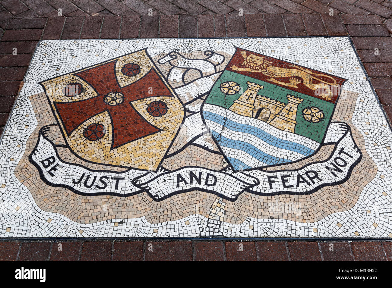 'Be Just and Fear Not', Carlisle's motto, entrance to Tullie House Museum and Art Gallery, Carlisle, Cumbria, England, United Kingdom Stock Photo