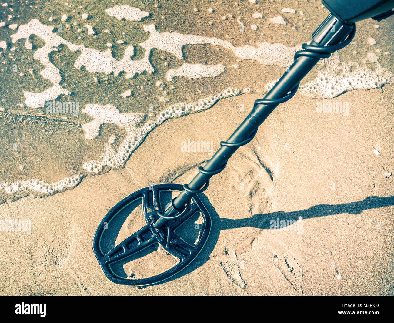metal detector on the beach Stock Photo Alamy