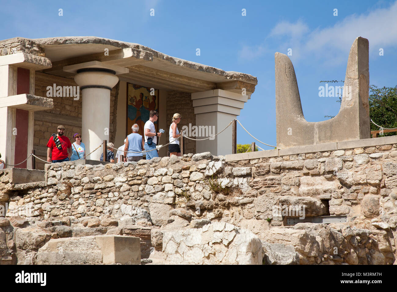 South facade and Propylaeum with Horns of consecration symbol of Minoan sacred bull, Knossos palace archaeological site, Crete island, Greece, Europe Stock Photo