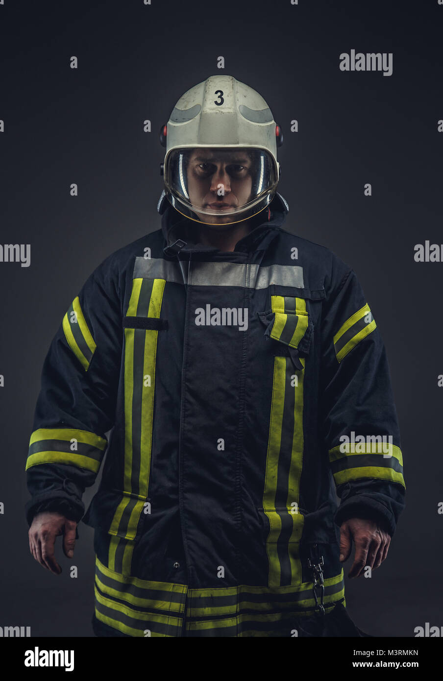 Picture of firefighter in uniform Stock Photo Alamy