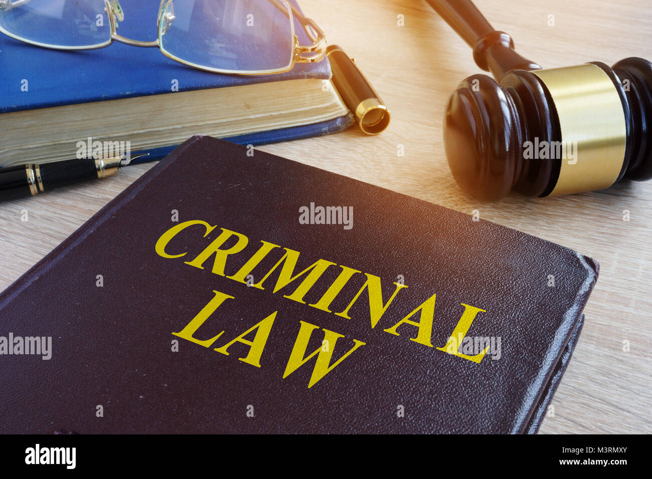 Criminal law and gavel in a court. Stock Photo