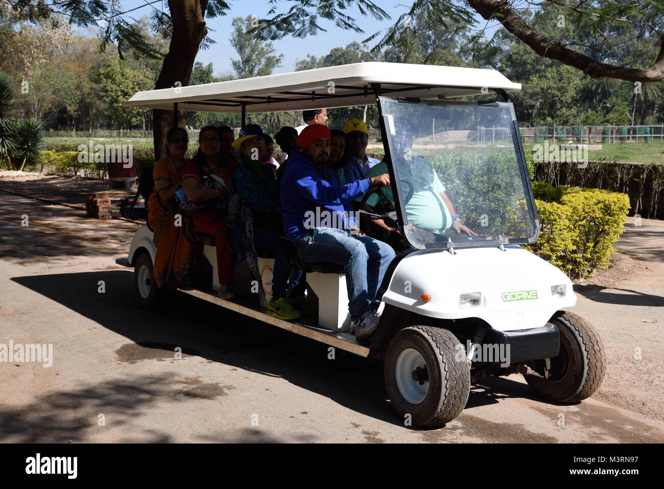 tourists in Eco friendly Electric vehicle, Mahendra Choudhary zoo, Chandigarh, haryana, India, Asia Stock Photo