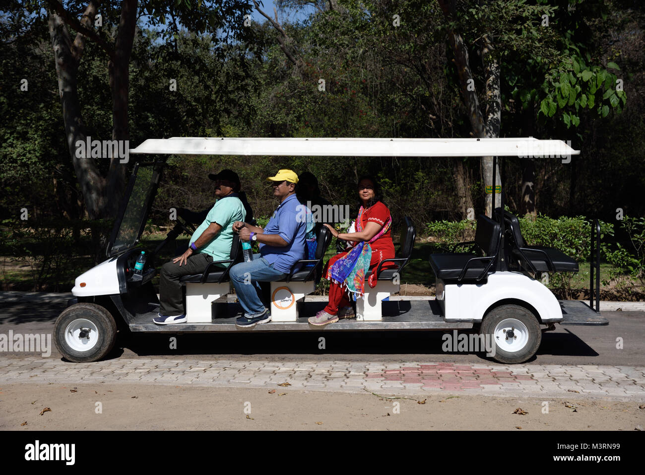 tourists in Eco friendly Electric vehicle, Mahendra Choudhary zoo, Chandigarh, haryana, India, Asia Stock Photo