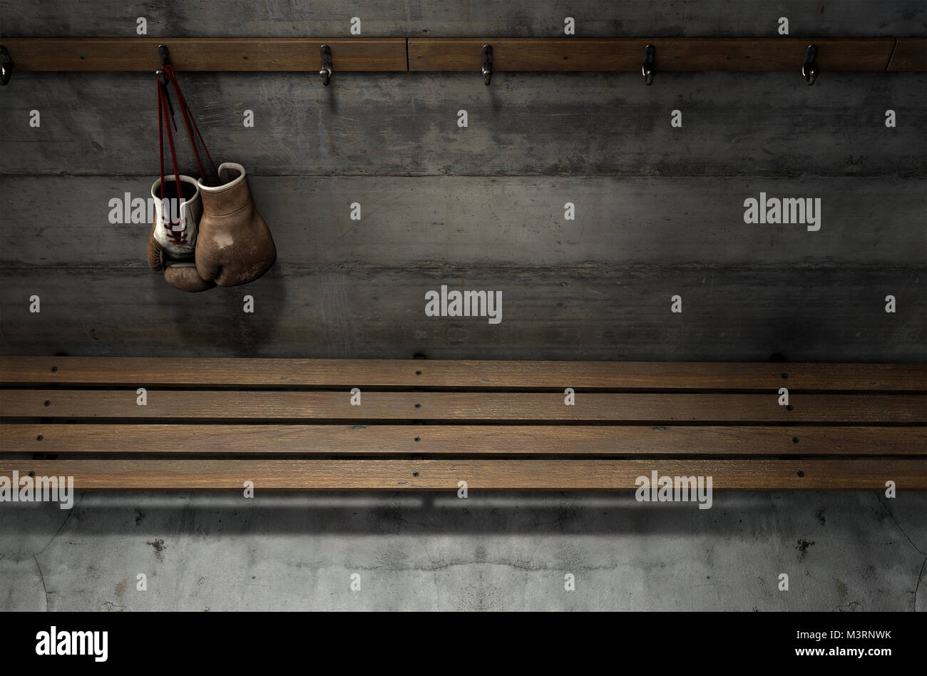Spotlit old vintage boxing gloves hanging on a hanger above an empty wooden bench in a locker change room - 3D render Stock Photo