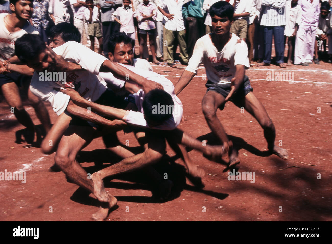 Men playing kabaddi game, India, Asia Stock Photo