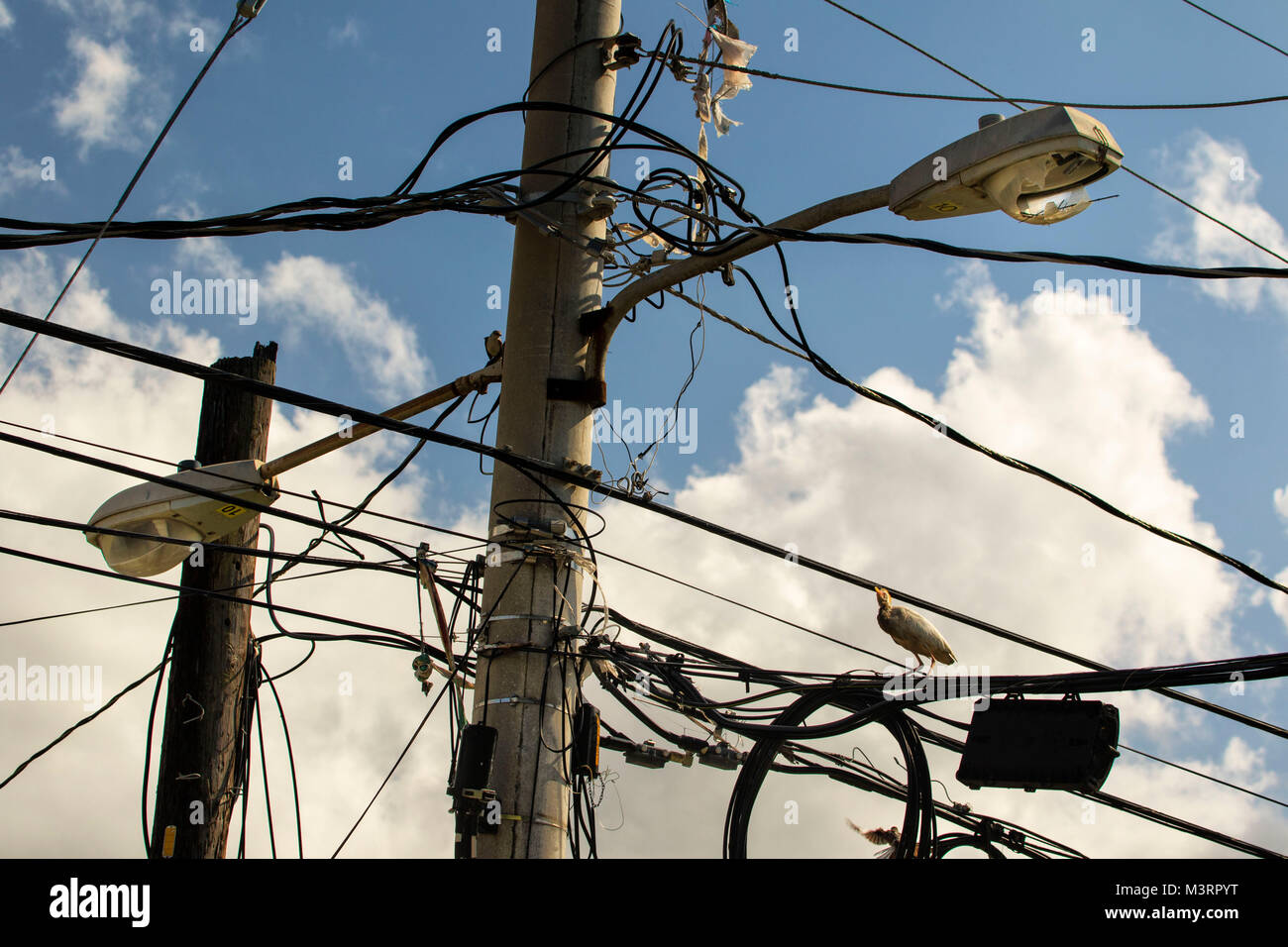 pole and street light against a bright sky, Ocho Rios