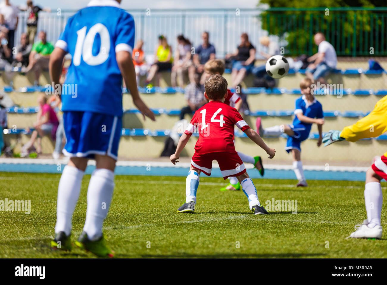 Running Soccer Football Players. Soccer Kick; School Football Game