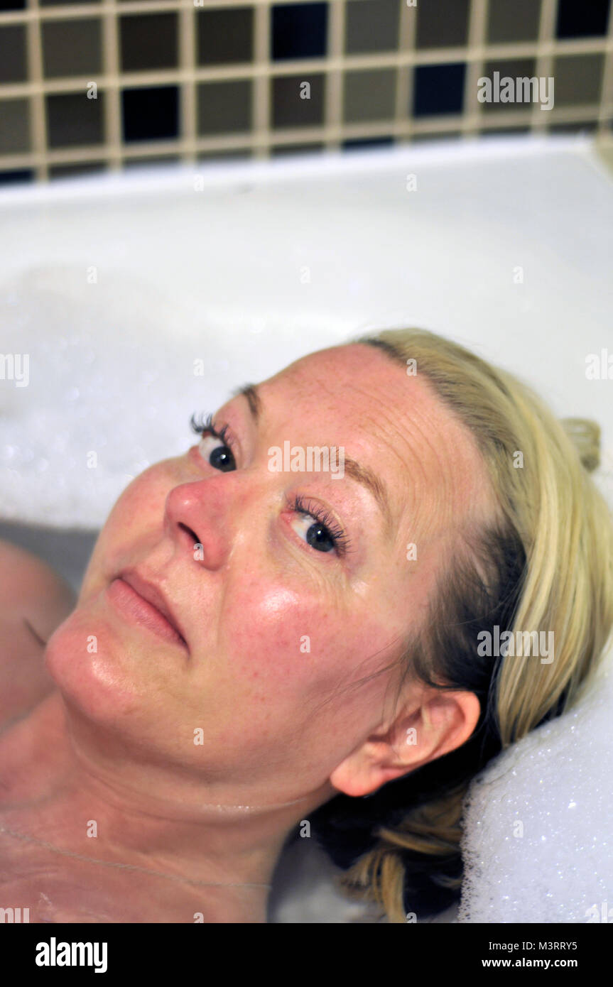 Woman in the bath Stock Photo