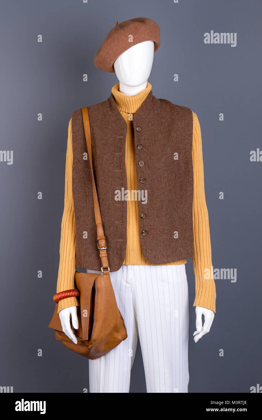 Mannequin in brown beret and waistcoat. Stock Photo