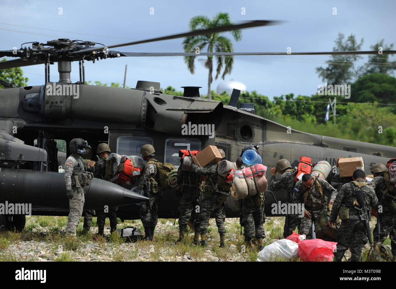 A U.S. Army UH-60 Black Hawk provides support to Honduras during Operation CARAVANA XIII, Nov. 4, 2015, in the Gracias a Dios department (state) of Honduras. The U.S. has provided airlift support at the request of the Honduran government since October 2014, enabling the Honduran military greater freedom of operation to counter drug trafficking and related criminal activities. (U.S. Air Force photo by Capt. Christopher J. Mesnard/Released) 151104-F-DT859-104 by ussouthcom Stock Photo