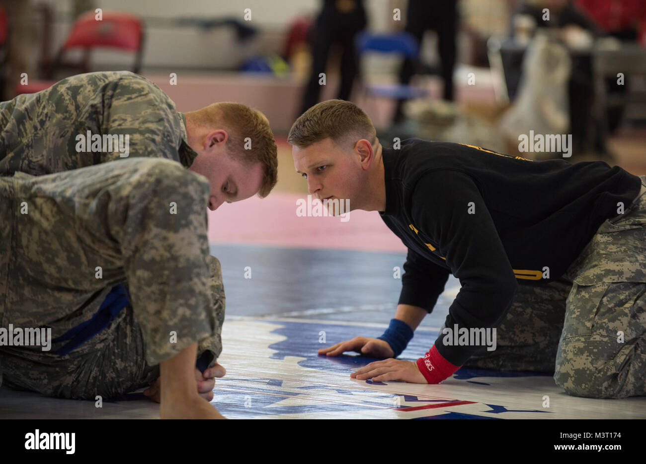 An U.S. Army combatives instructor refs a bout between a soldier and ...